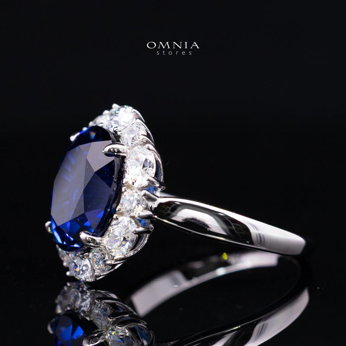 Khloe Blue Lab-Grown Sapphire Ring with GRC Certificate, Oval 10×12mm, in 925 Sterling Silver – Classic Halo Cluster