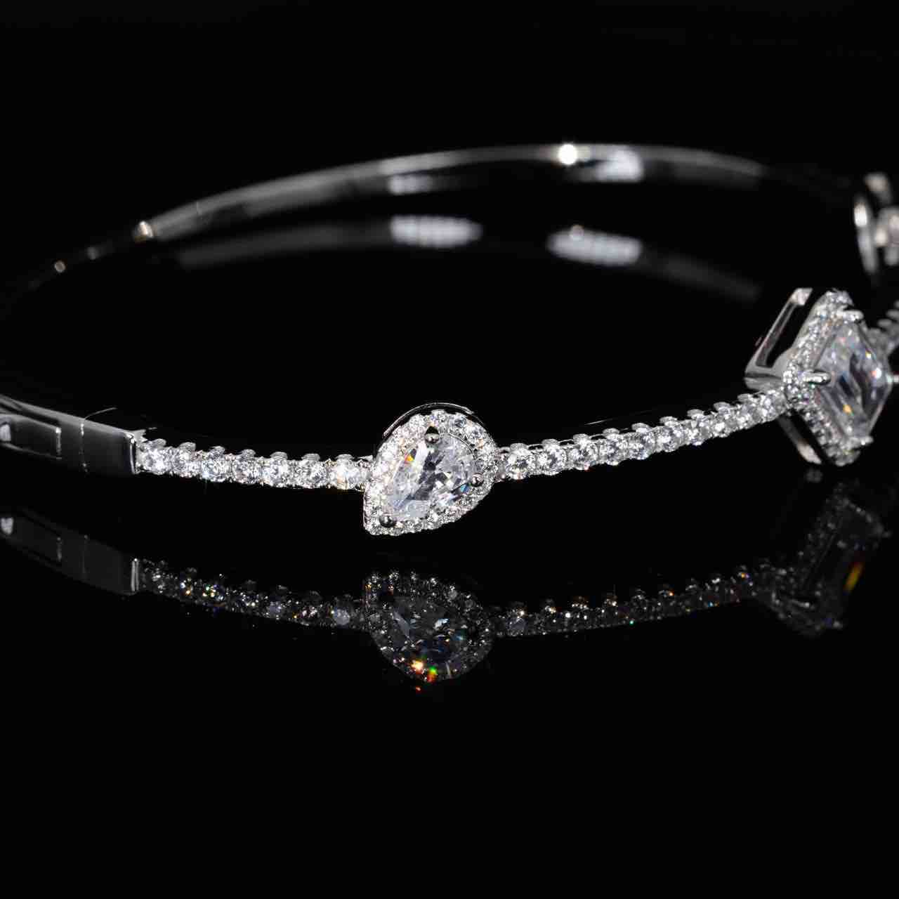 Omnia Eissha White Bangle With High Quality Simulated Diamonds In 925 Silver - OMNIASTORES UAE